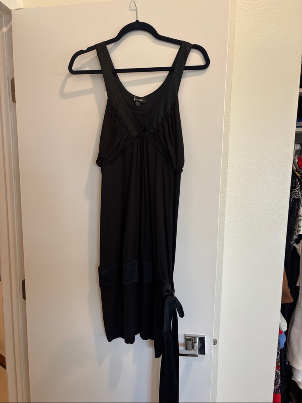 Bebe Black Mini Dress. Drop waisted with satin sash. Perfect for cocktail hour.